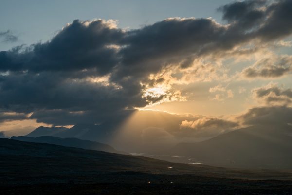 Beautiful light tries to detract me from the clouds that hide the mountain peaks