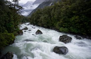 Mountain stream crossing the road